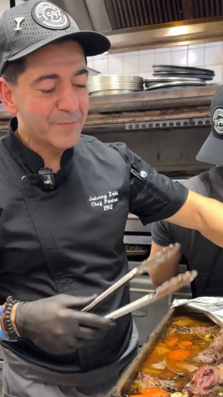 Chef partner Johnny at the pass at 1592 Wood Fired, Sarasota