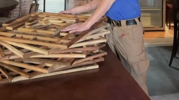 Hanami Sushi build-out in Sarasota with the wooden slats for the kumiko screens laid out, filmed for the restaurant's Instagram before opening