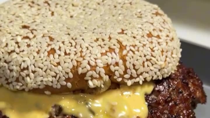 The smash burger from the Lucky 8 SRQ reel filmed by Siesta Media, 715K+ views